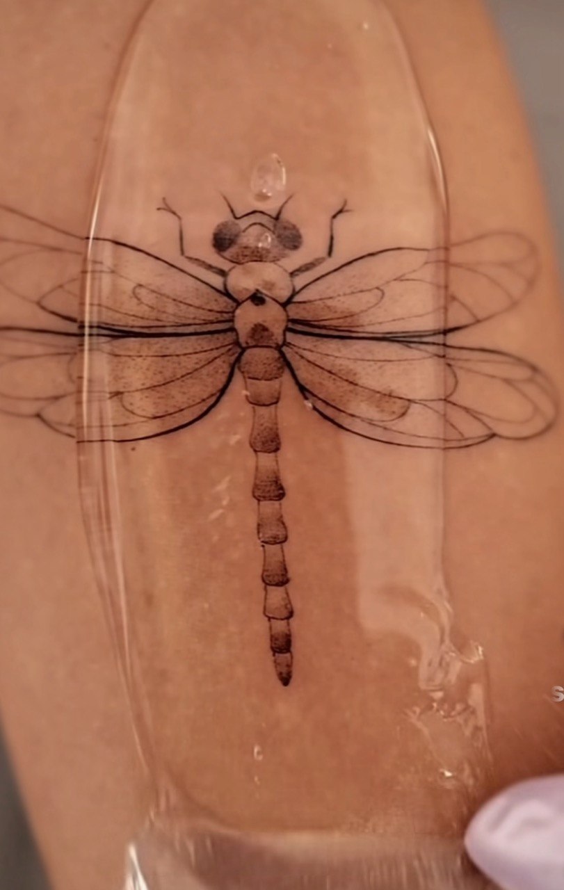 Fine-line dragonfly tattoo - Sisters Ink Tattoo Studio Da Nang